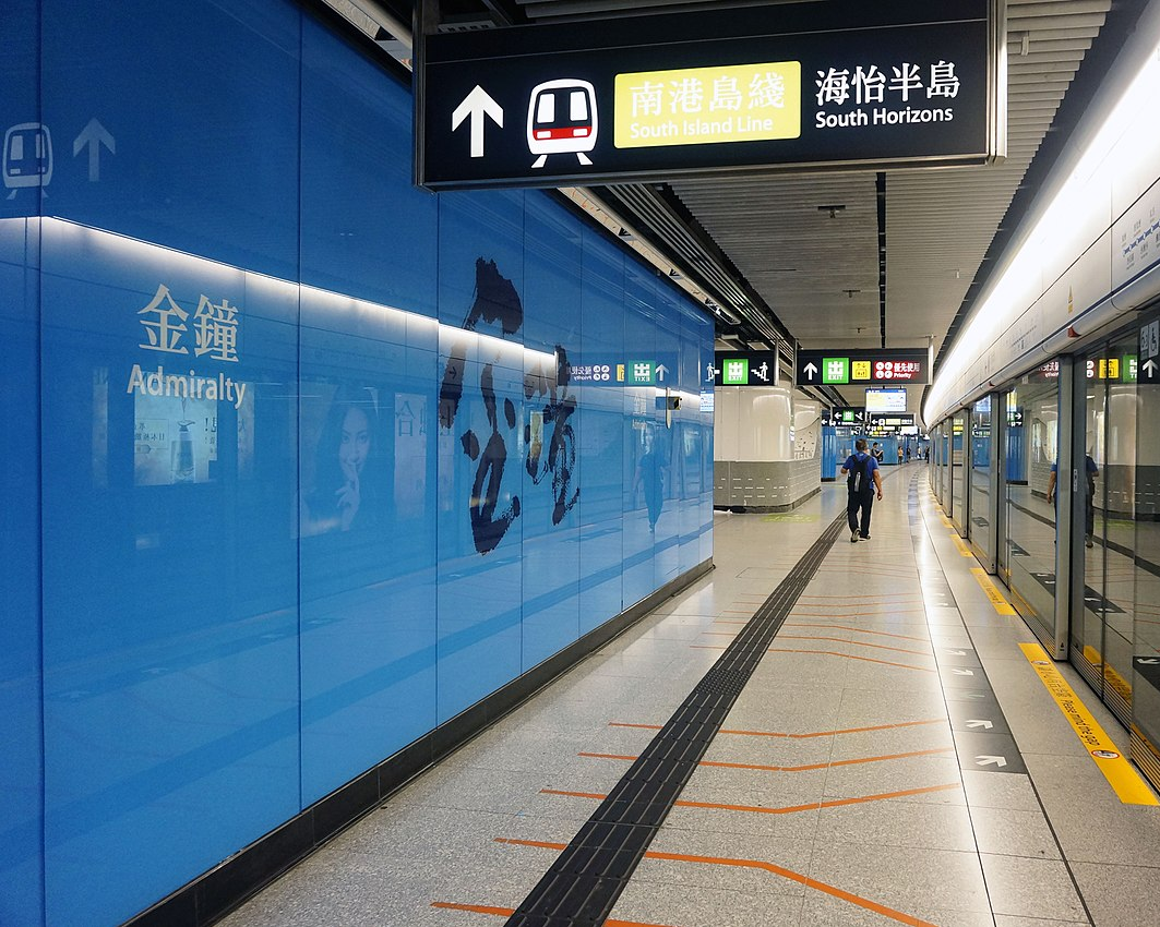 Floor guidelines in a Hong Kong station that shows where people should line up to wait for the trains