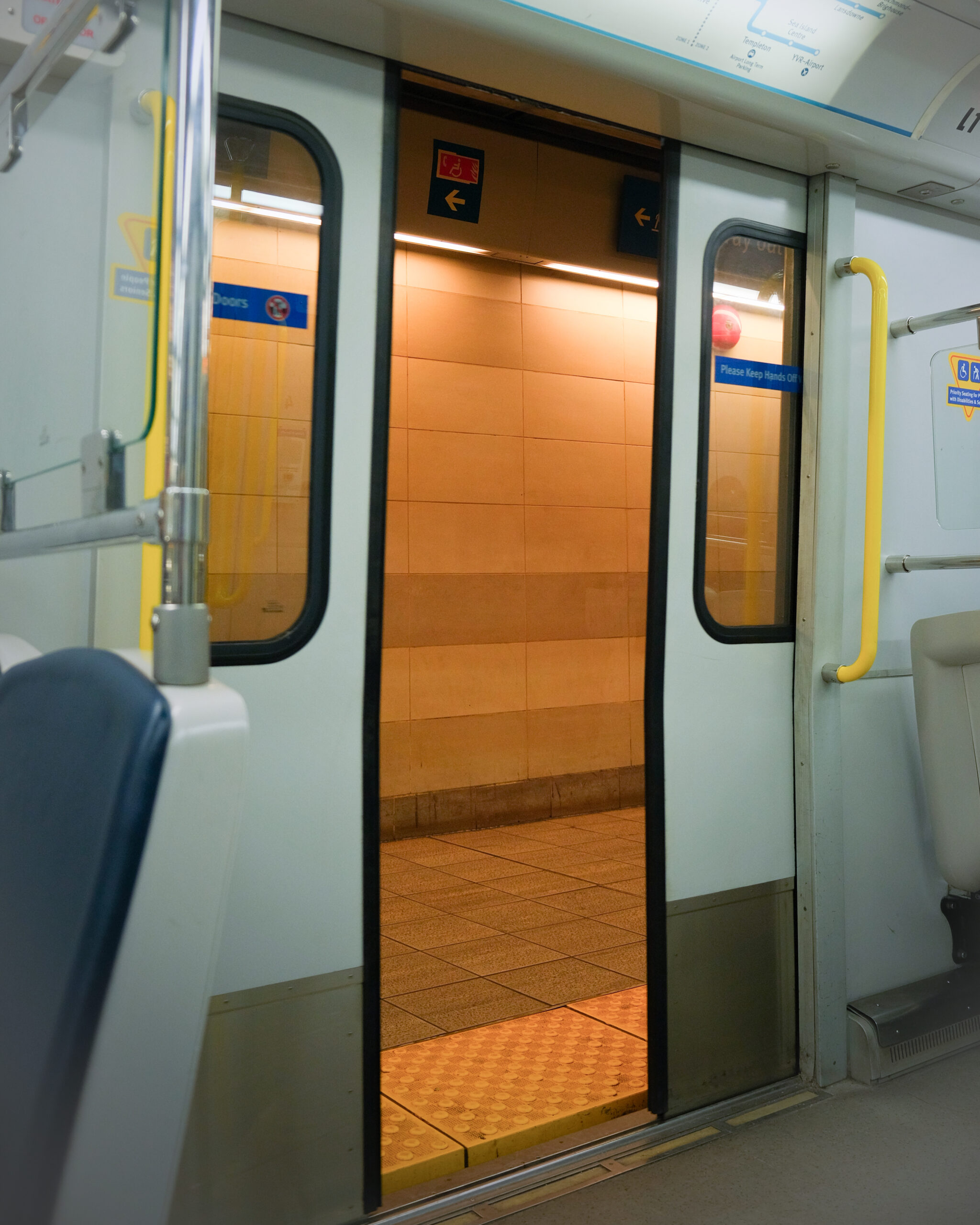 View from inside the Canada Line with the doors opening